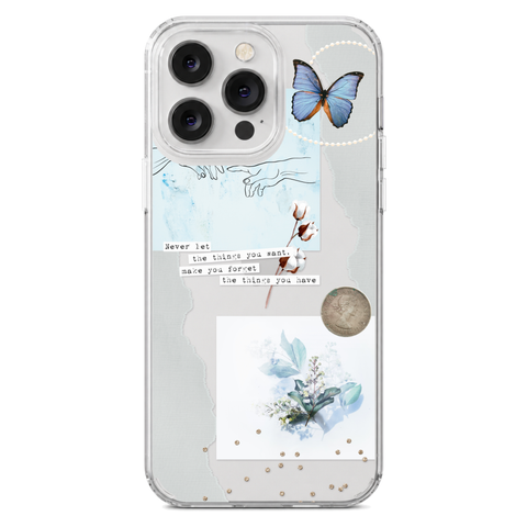 Pale Blue Butterfly Scraps Clear Phone Case shown on iPhone 14 Pro Max