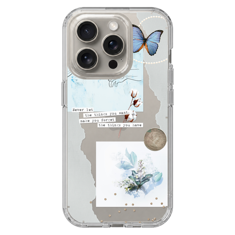 Pale Blue Butterfly Scraps Clear Phone Case shown on iPhone 15 Pro