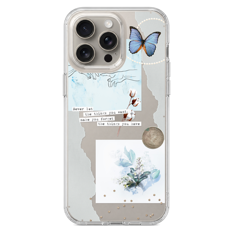 Pale Blue Butterfly Scraps Clear Phone Case shown on iPhone 15 Pro Max
