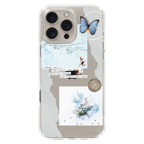 Pale Blue Butterfly Scraps Clear Phone Case shown on iPhone 16 Pro Max