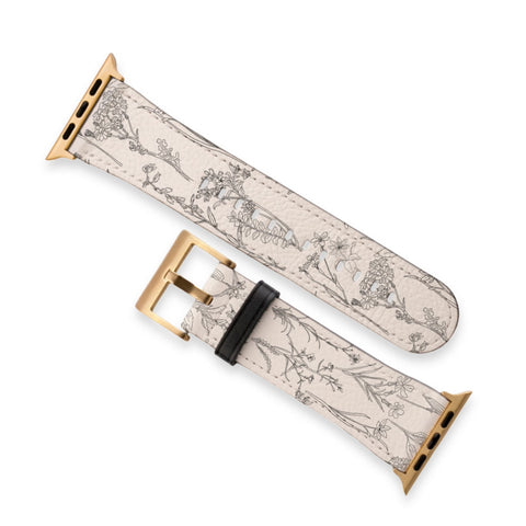 Apple Watch band with a botanical line art design. This pictures shows the watch straps with gold hardware. (Feat)