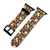 Apple watch band that has a brown background, with beige flowers and yellowish leaves.